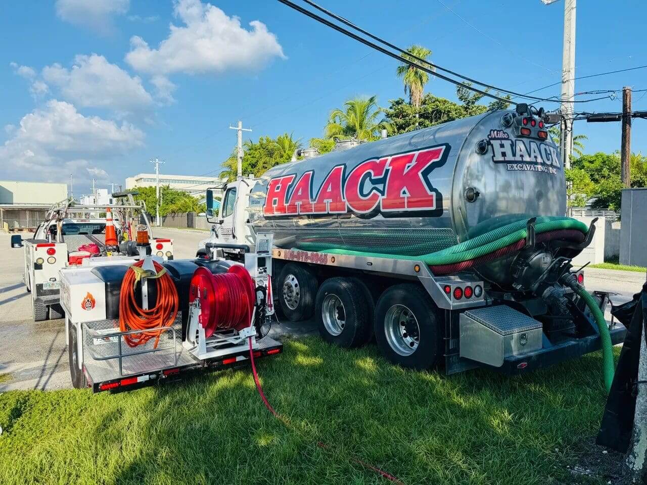 Certified technician performing routine lift station service on site